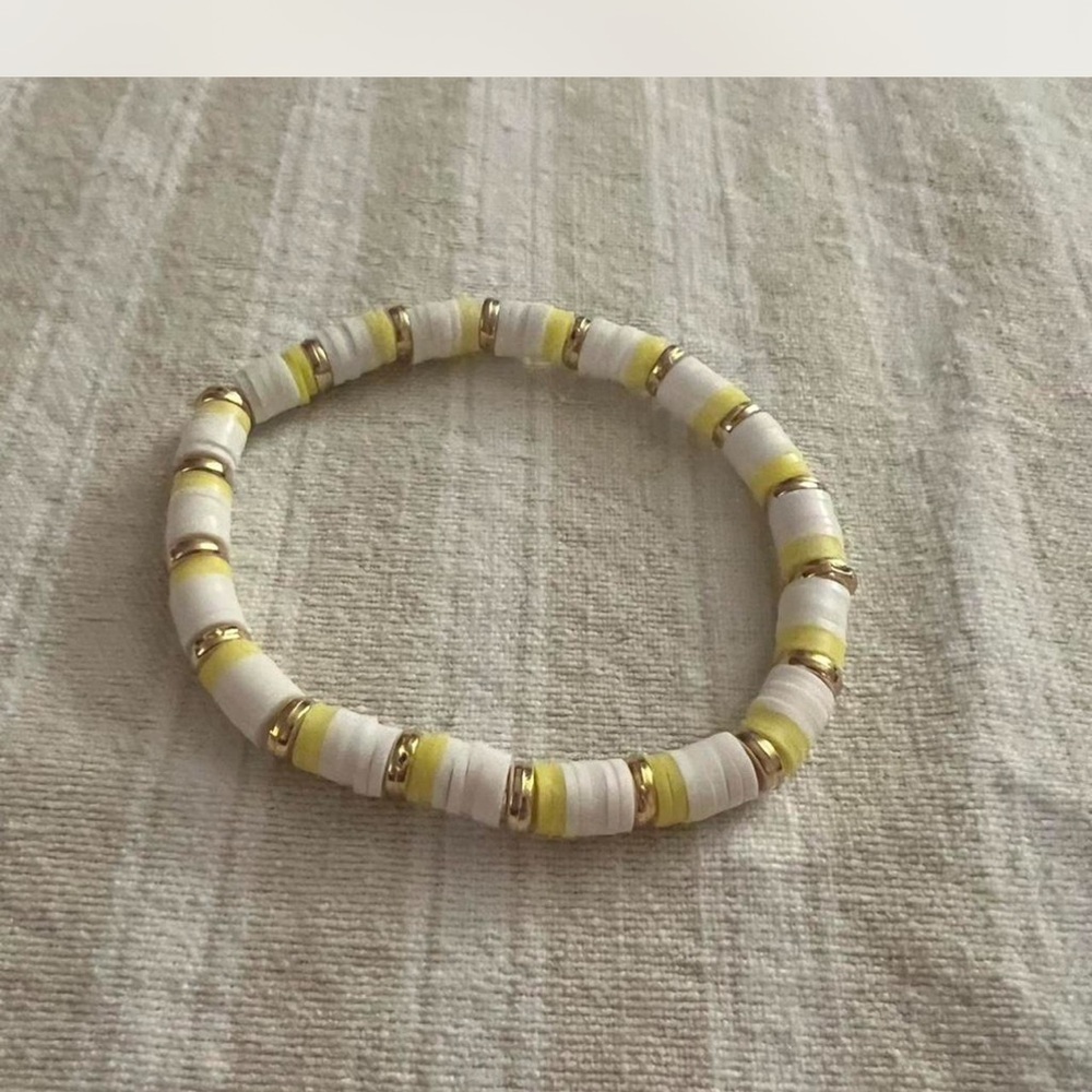 White & Yellow Beaded Bracelet with Gold Accents